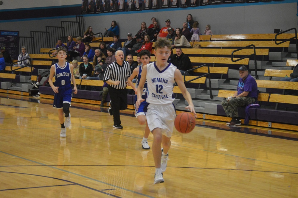 Colten Corby brings the ball up on a fast break.