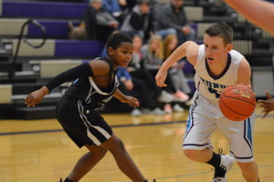 NCMS Boys Basketball Faces the Riverside Cyclones